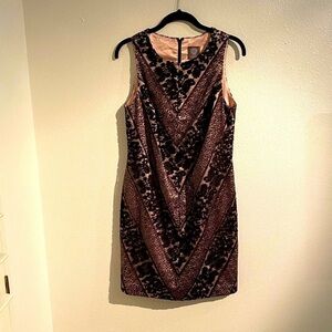 Vince Camuto black and nude sequined dress.